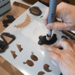 Wooden Block Halloween Decor - Ghosts Stenciling on ghost faces.